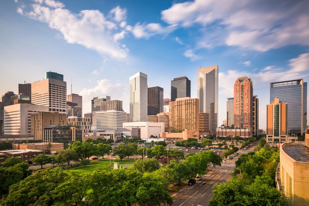 A skyline image of downtown Houston, Texas.