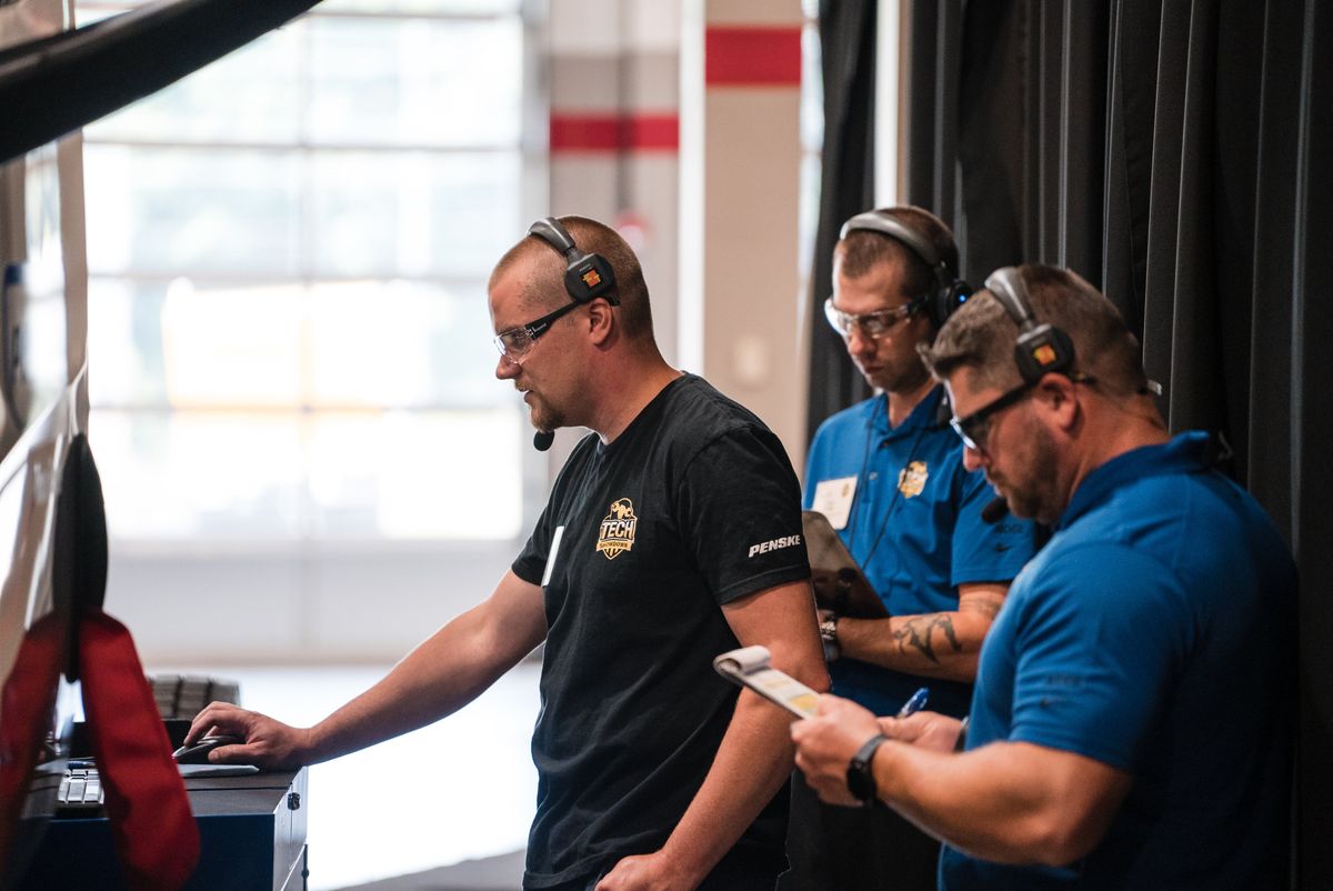 Technicians participating in a hands-on skills challenge.